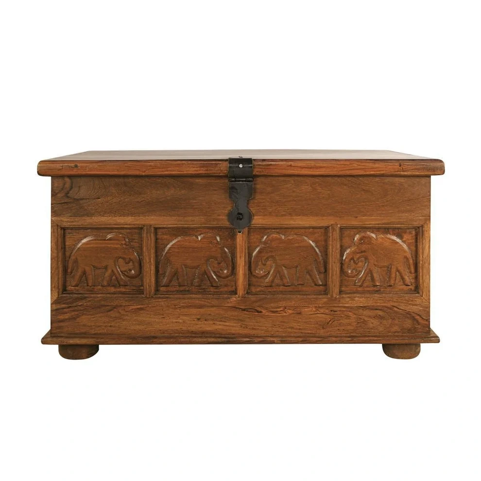 Hand-carved elephant panels on a solid wood trunk